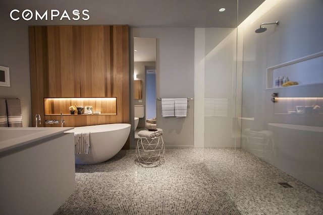 1 John St Unit 3B, New York City, NY 11201 - full bathroom with a walk in shower, a freestanding bath, and vanity