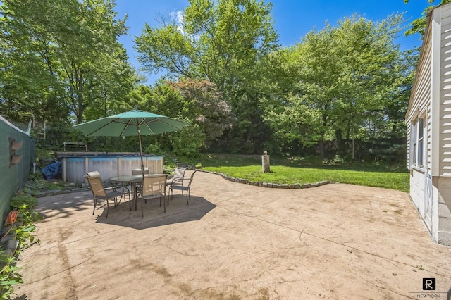 118 Stobe Ave, New York City, NY 10306 - view of patio with outdoor dining space and an outdoor pool