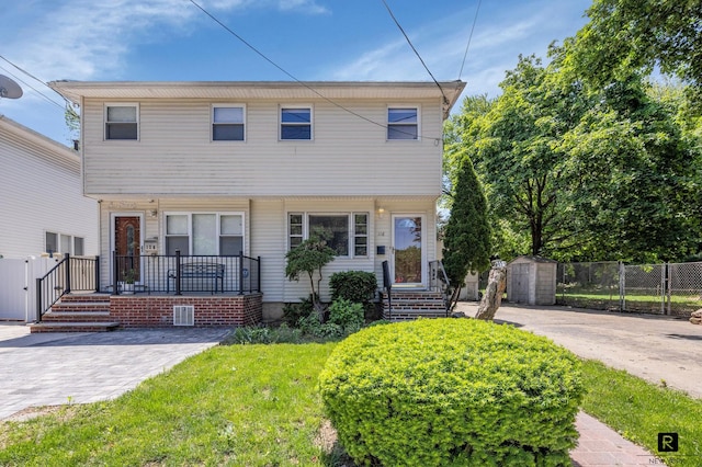 118 Stobe Ave, New York City, NY 10306 - view of front facade featuring a gate