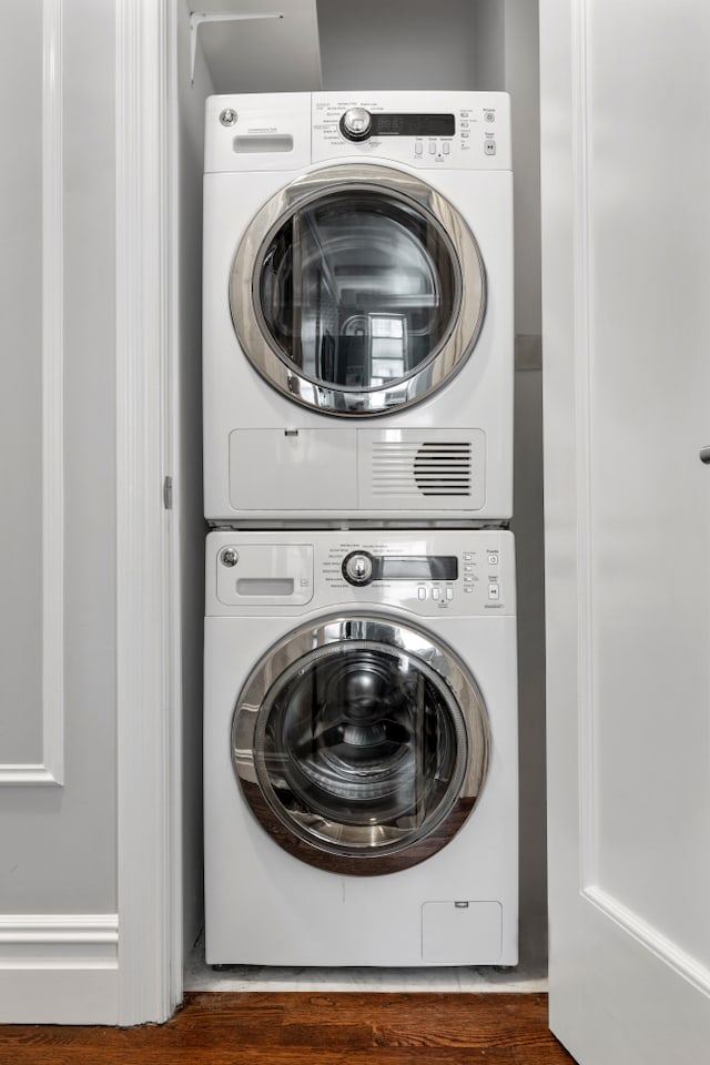 59 W 71st St Unit 4D, New York City, NY 10023 - laundry area featuring estacked washer and dryer