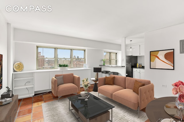 609 Columbus Ave Unit 14E, New York City, NY 10024 - living room featuring light tile patterned floors