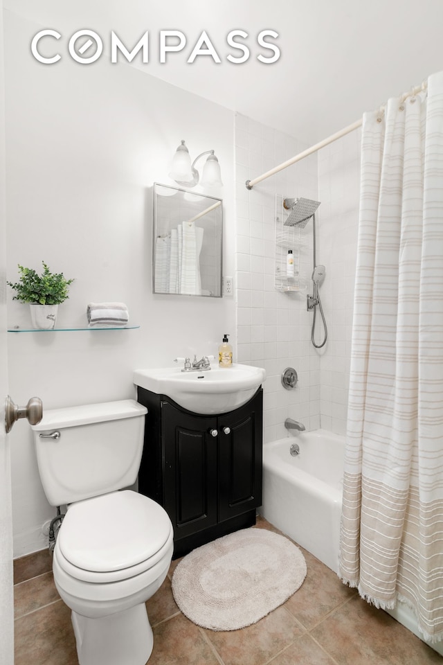 609 Columbus Ave Unit 14E, New York City, NY 10024 - bathroom with vanity, shower / bathtub combination with curtain, and tile patterned flooring