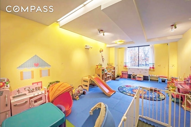 300 Rector Pl Unit 4E, New York City, NY 10280 - recreation room with carpet floors