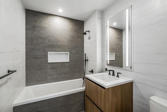 11 Hancock Pl Unit 304, New York City, NY 10027 - bathroom featuring vanity, tiled shower / bath, and toilet