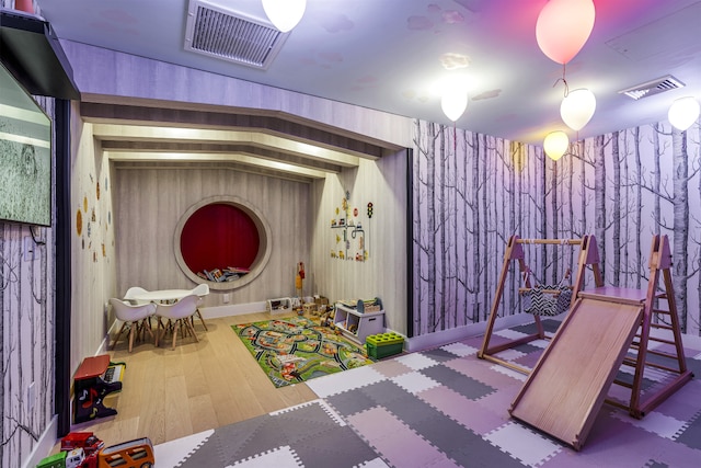 11 Hancock Pl Unit 304, New York City, NY 10027 - recreation room featuring wallpapered walls and wood finished floors