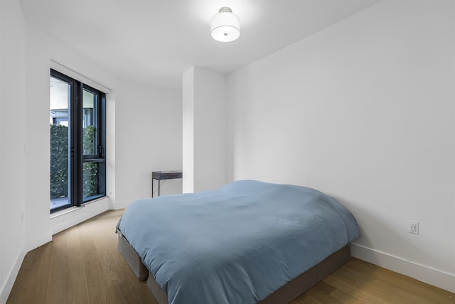 11 Hancock Pl Unit 304, New York City, NY 10027 - bedroom with wood finished floors and baseboards