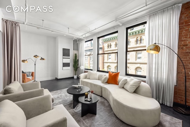 36 W 15th St Unit 4, New York City, NY 10011 - living area featuring brick wall
