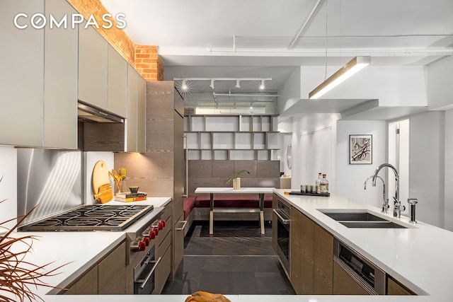 36 W 15th St Unit 4, New York City, NY 10011 - kitchen featuring a sink, light countertops, backsplash, dishwasher, and stainless steel oven