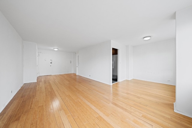 201 E 36th St Unit 14F, New York City, NY 10016 - spare room featuring light wood finished floors