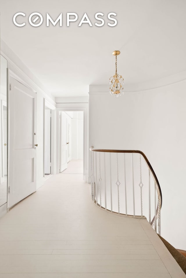 12 E 88th St Unit Ph11/12B, New York City, NY 10128 - hall with a chandelier and an upstairs landing