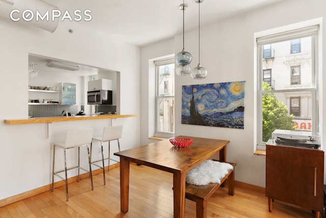 318 Knickerbocker Ave Unit 2A, New York City, NY 11237 - dining space with hardwood / wood-style flooring and baseboards