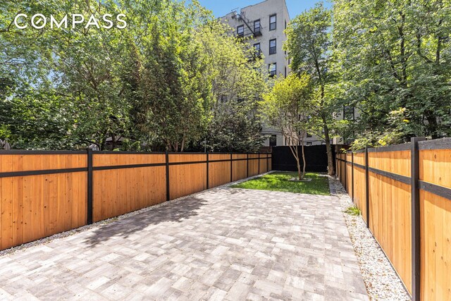 1050 Sterling Place, New York City, NY 11213 - fenced backyard with a patio