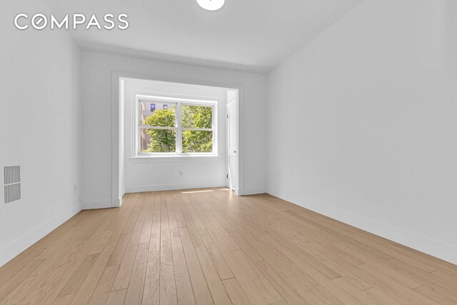 1050 Sterling Place, New York City, NY 11213 - spare room with light wood-style floors and baseboards