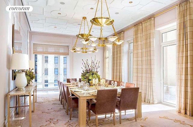30 Park Pl Unit 60C, New York City, NY 10007 - dining space featuring a chandelier, ornamental molding, and light colored carpet