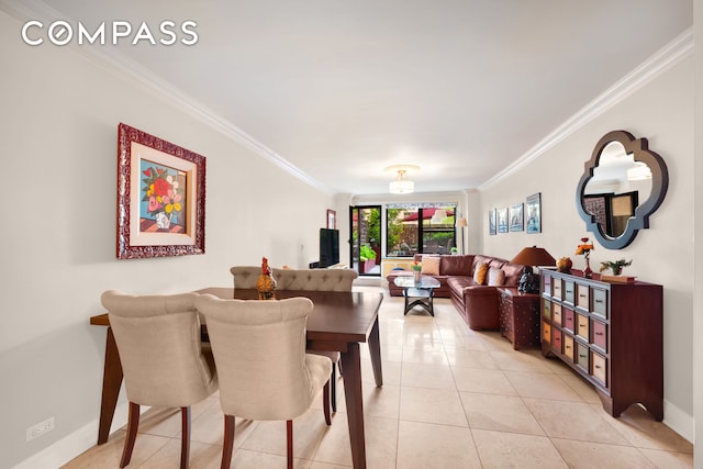 301 E 62nd St Unit 2K, New York City, NY 10065 - dining space featuring crown molding, light tile patterned floors, and baseboards