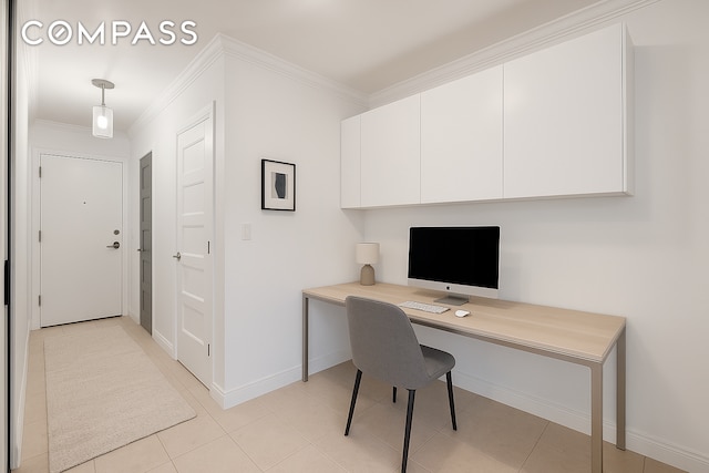 301 E 62nd St Unit 2K, New York City, NY 10065 - office space with crown molding, built in study area, and baseboards