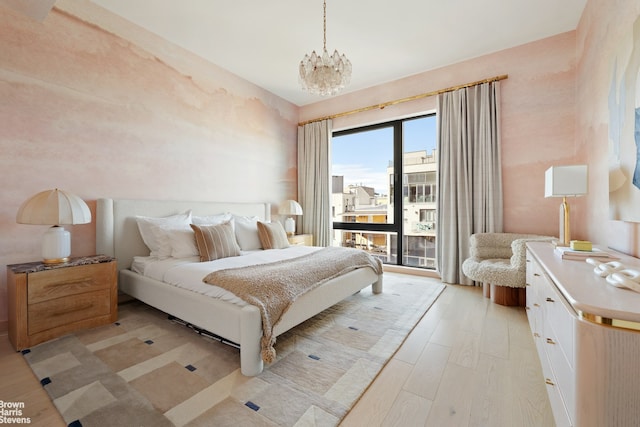 207 N 5th St Ph, Ph, New York City, NY 11211 - bedroom featuring light wood finished floors, access to outside, and a chandelier