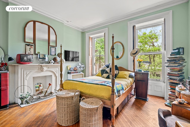 269 Clinton Ave Unit C1, New York City, NY 11205 - bedroom with hardwood / wood-style flooring and crown molding