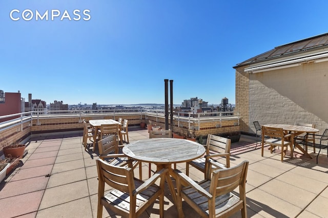 24 Monroe Pl Unit 7D, New York City, NY 11201 - view of patio / terrace featuring outdoor dining area and a city view