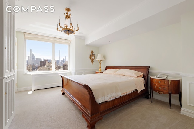 1049 5th Ave Unit Ph20, New York City, NY 10028 - bedroom featuring light carpet, a chandelier, crown molding, and a view of skyline