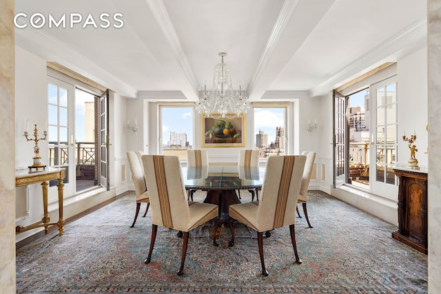 1049 5th Ave Unit Ph20, New York City, NY 10028 - dining room featuring a chandelier, ornamental molding, beamed ceiling, and a city view