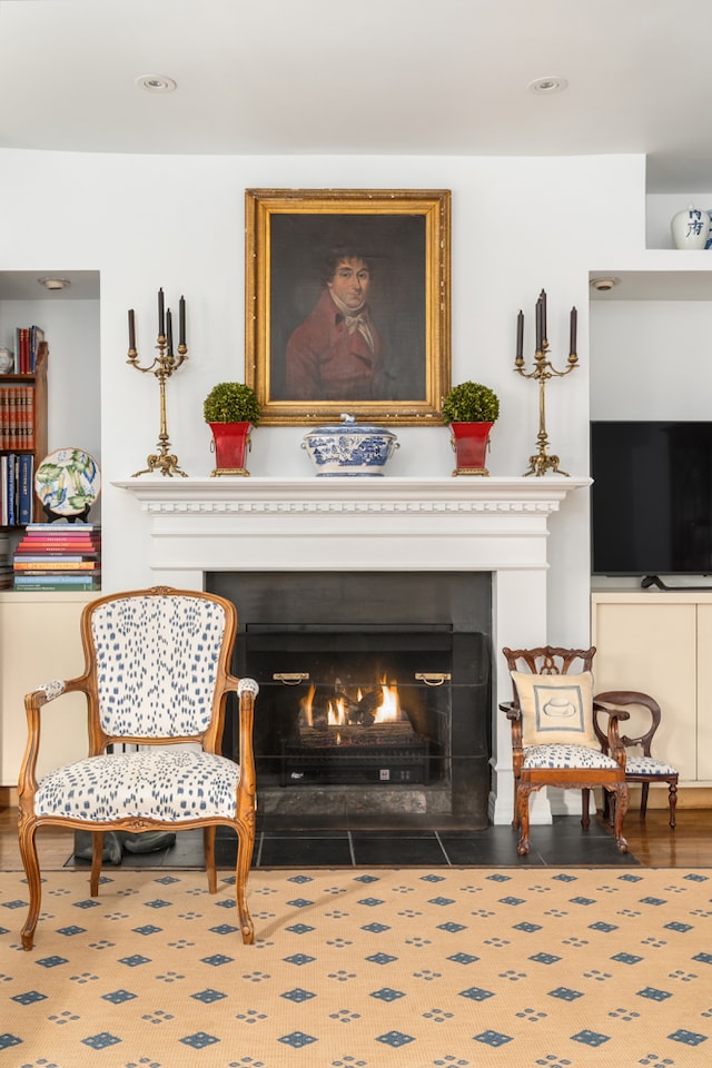 56 W 71st St Unit 1B, New York City, NY 10023 - sitting room featuring a fireplace with flush hearth and recessed lighting