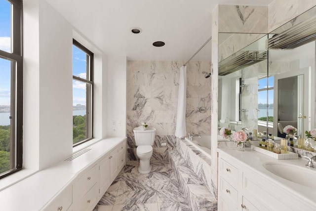 50 Riverside Dr Unit 10B, New York City, NY 10024 - bathroom with marble tiled flooring, vanity, a combined bath / shower with marble appearance, toilet, and a water view