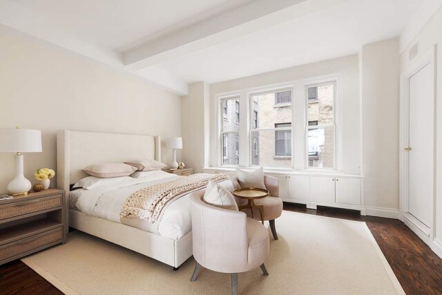 50 Riverside Dr Unit 10B, New York City, NY 10024 - bedroom with dark wood finished floors, beamed ceiling, and baseboards