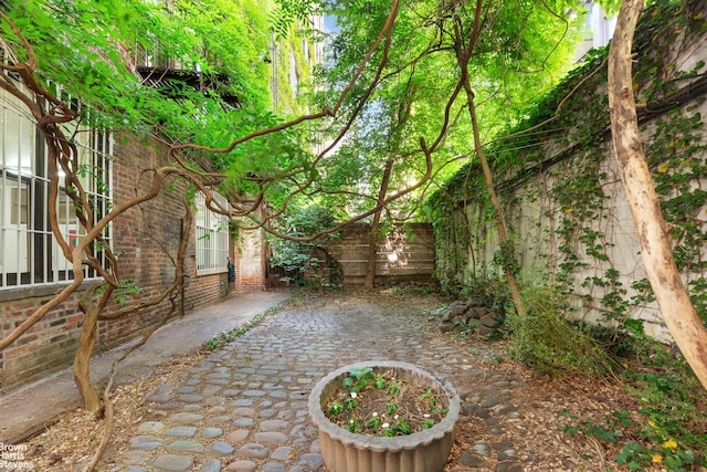 41 Bleecker St Unit 1, New York City, NY 10012 - fenced backyard featuring a patio