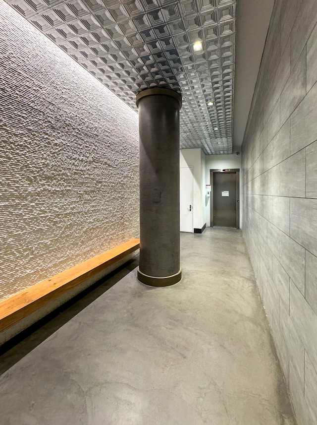 10 Bleecker St Unit 7A, New York City, NY 10012 - hallway with concrete flooring and an ornate ceiling