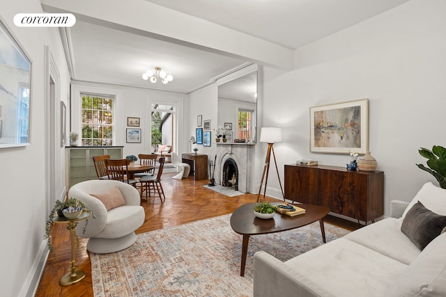 111 E 10th St Unit 20, New York City, NY 10003 - living area featuring baseboards and a fireplace with flush hearth