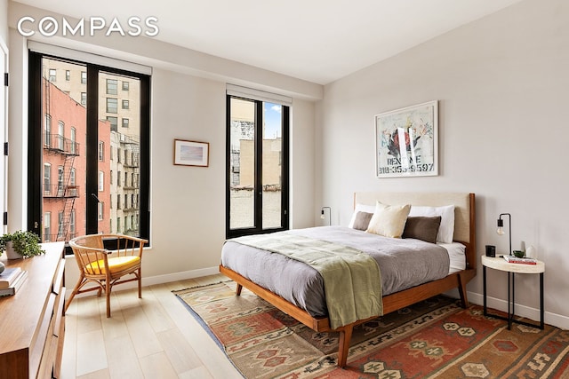 856 Washington Ave Unit 6A, New York City, NY 11238 - bedroom with baseboards and wood finished floors