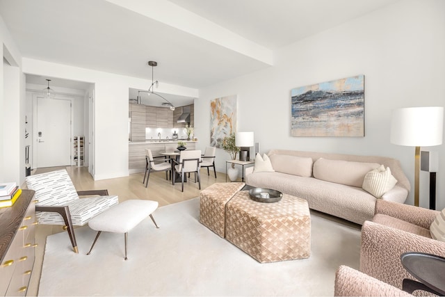 155 W 11th St Unit 14D, New York City, NY 10011 - living room with light wood-style floors and baseboards