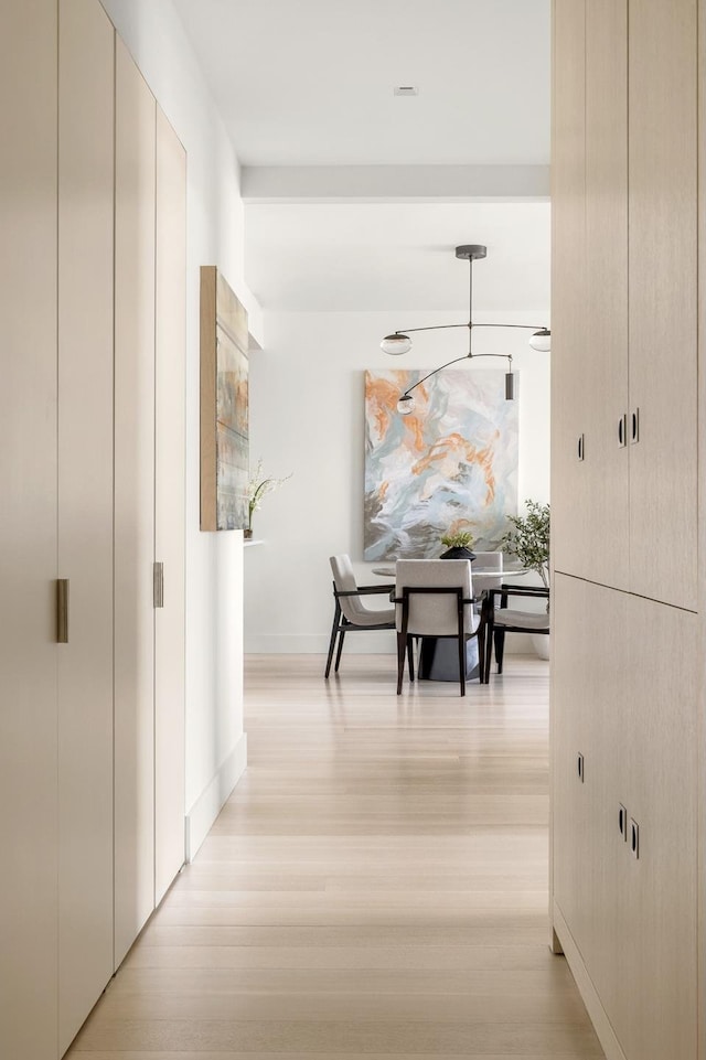155 W 11th St Unit 14D, New York City, NY 10011 - hall featuring light wood-style floors