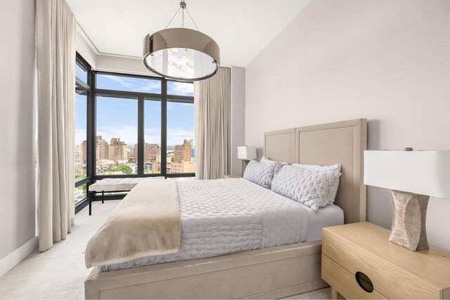 155 W 11th St Unit 14D, New York City, NY 10011 - bedroom featuring a city view and light carpet