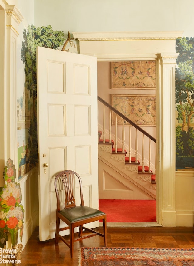203 Prince St, New York City, NY 10012 - stairs featuring wood finished floors and a decorative wall