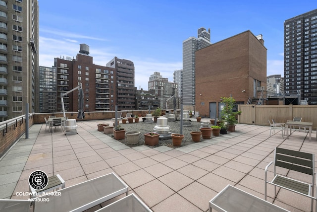 235 E 87th St Unit 7E, New York City, NY 10128 - view of patio / terrace with a view of skyline
