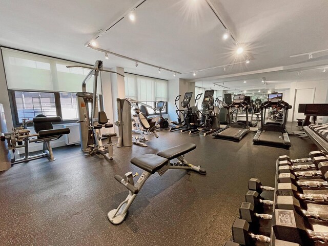 117 E 57th St Unit 35/36F, New York City, NY 10022 - workout area with rail lighting