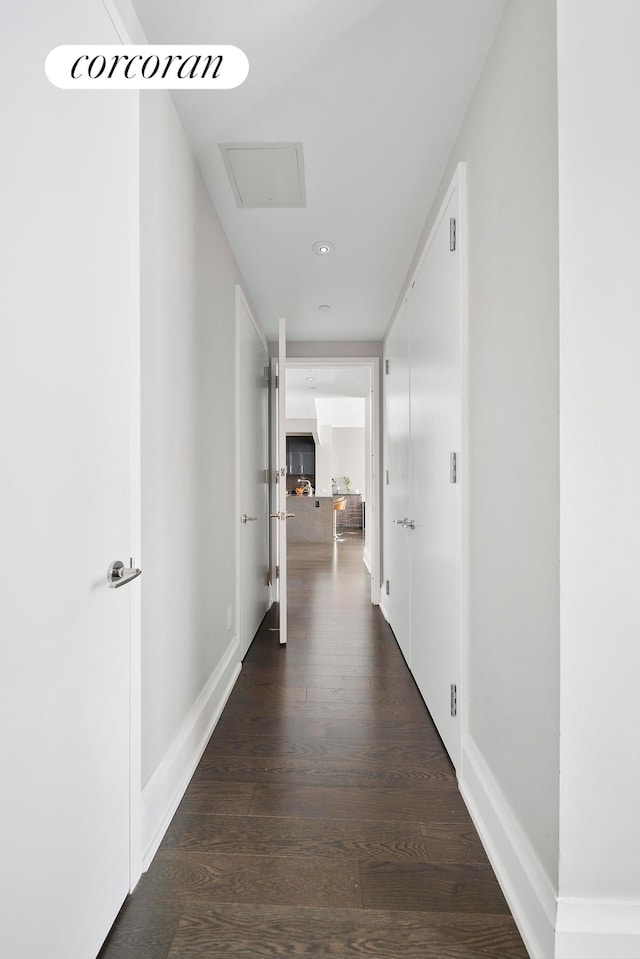 50 Riverside Blvd Unit 4H, New York City, NY 10069 - hallway with attic access, wood finished floors, baseboards, and recessed lighting