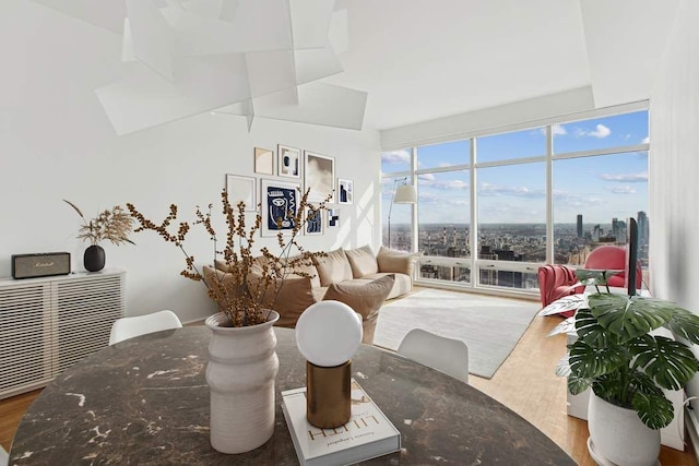 151 E 58th St Unit 42C, New York City, NY 10022 - living area featuring wood finished floors