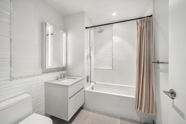 128 W 23rd St Unit 15B, New York City, NY 10011 - full bathroom with vanity, shower / bath combination with curtain, tile patterned flooring, and toilet