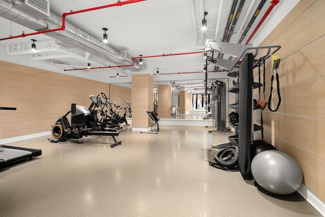128 W 23rd St Unit 15B, New York City, NY 10011 - gym with wood walls