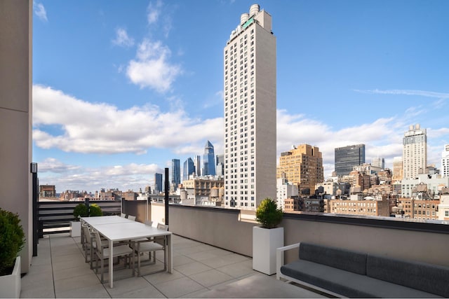 128 W 23rd St Unit 15B, New York City, NY 10011 - view of patio / terrace featuring a skyline view and outdoor dining area