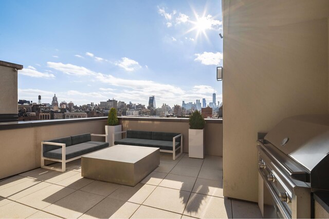 128 W 23rd St Unit 15B, New York City, NY 10011 - view of patio / terrace featuring a skyline view, outdoor lounge area, and area for grilling