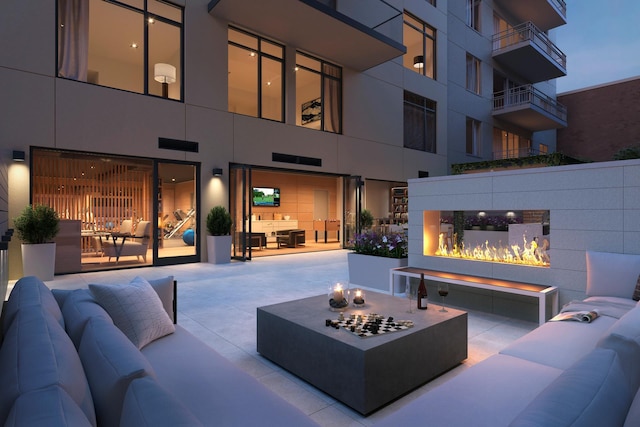 128 W 23rd St Unit 15B, New York City, NY 10011 - view of patio with an outdoor living space with a fire pit