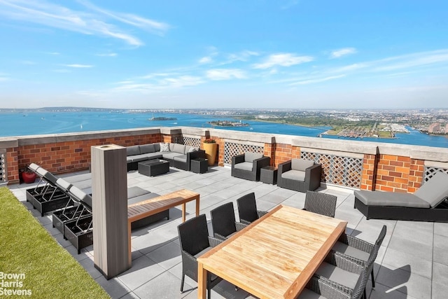 460 W 42nd St Unit 58G, New York City, NY 10036 - view of patio with outdoor lounge area and a water view