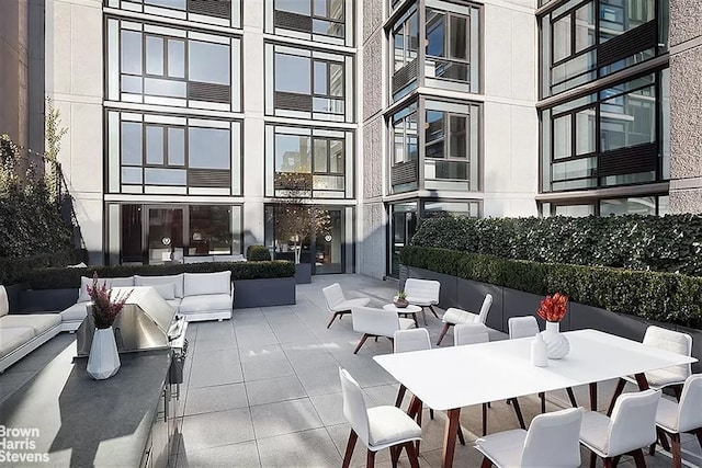 385 1st Ave Unit 9E, New York City, NY 10010 - view of patio with an outdoor living space and outdoor dining space
