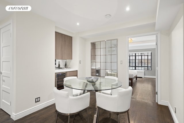 10 Park Ave Unit 3Ab, New York City, NY 10016 - dining area featuring beverage cooler, dark wood-style floors, wet bar, baseboards, and recessed lighting