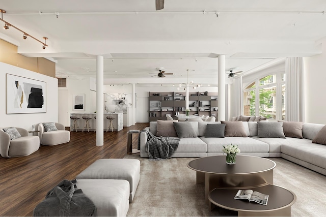 152 Wooster St Unit 2A, New York City, NY 10012 - living area with rail lighting, a ceiling fan, and wood finished floors