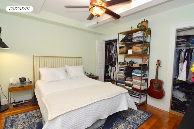 333 E 43rd St Unit 511, New York City, NY 10017 - bedroom with wood finished floors, baseboards, and a ceiling fan